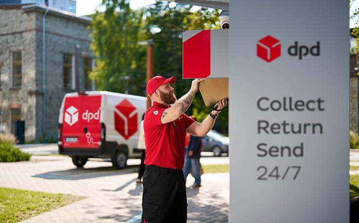 DPD courier is delivering packages to a locker for customers.